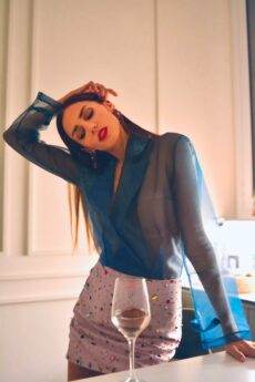 h-era pink skirt and petrol top